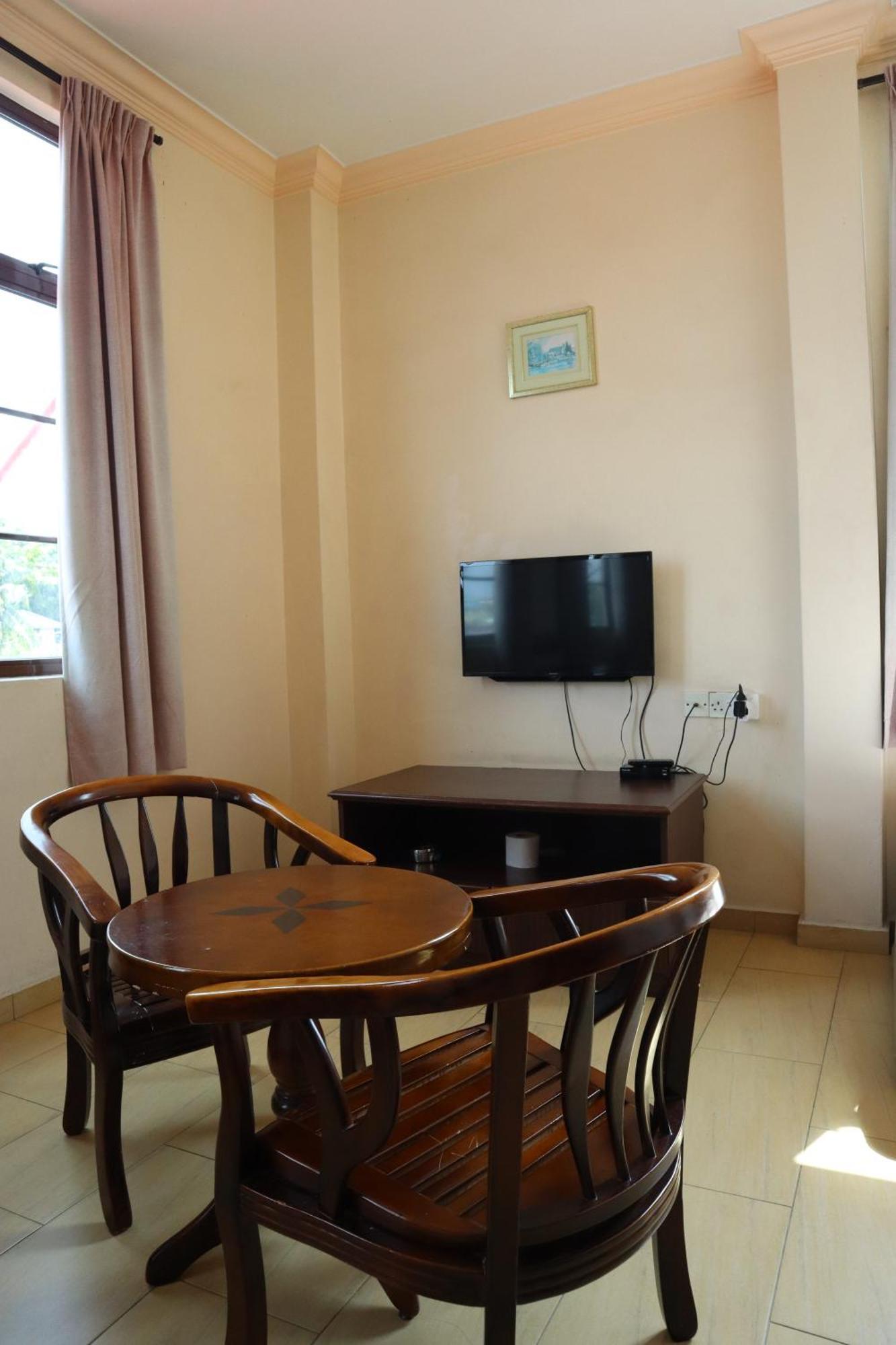Hotel Wangsamas Tampin Szoba fotó